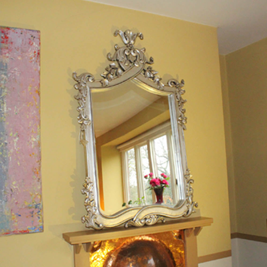silver ornate mirror