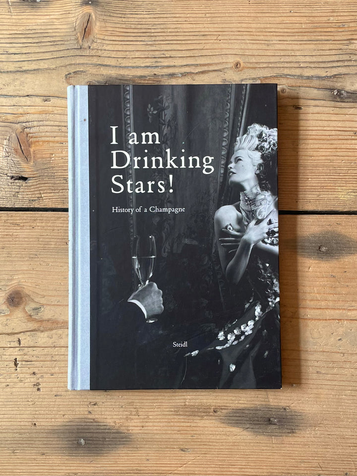 I am drinking stars! History of a champagne. Steidl