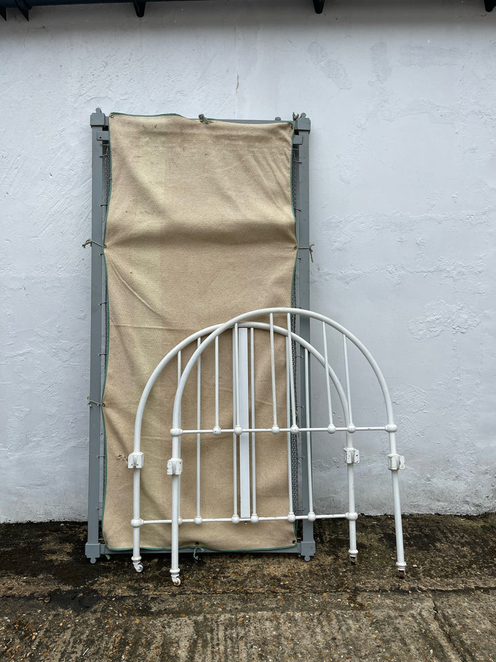 White Metal Framed Single Bed