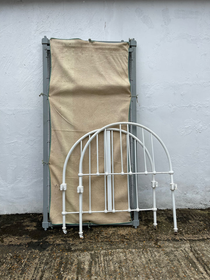 White Metal Framed Single Bed