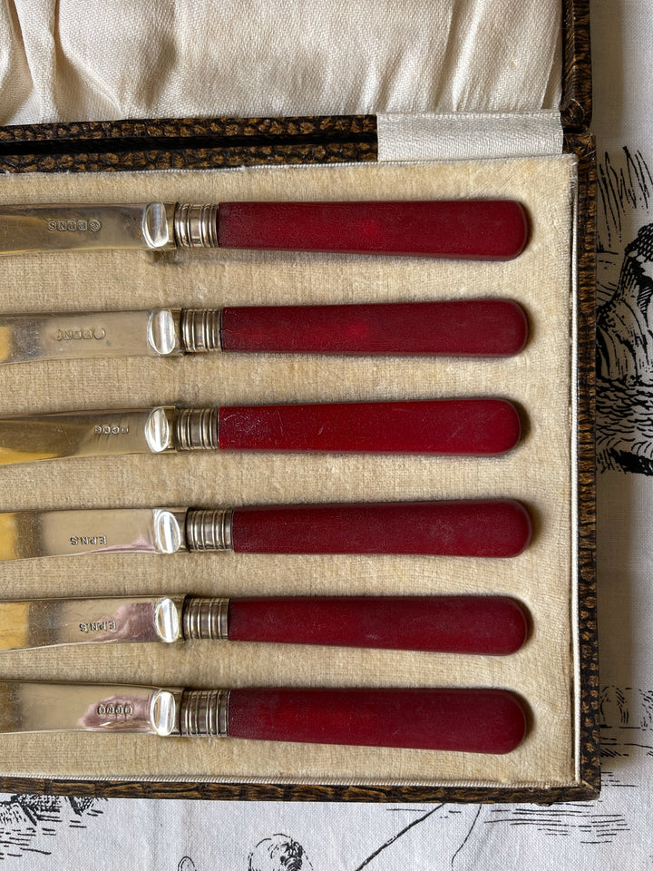 Vintage Silver Plated Red Bakelite Butter Knives