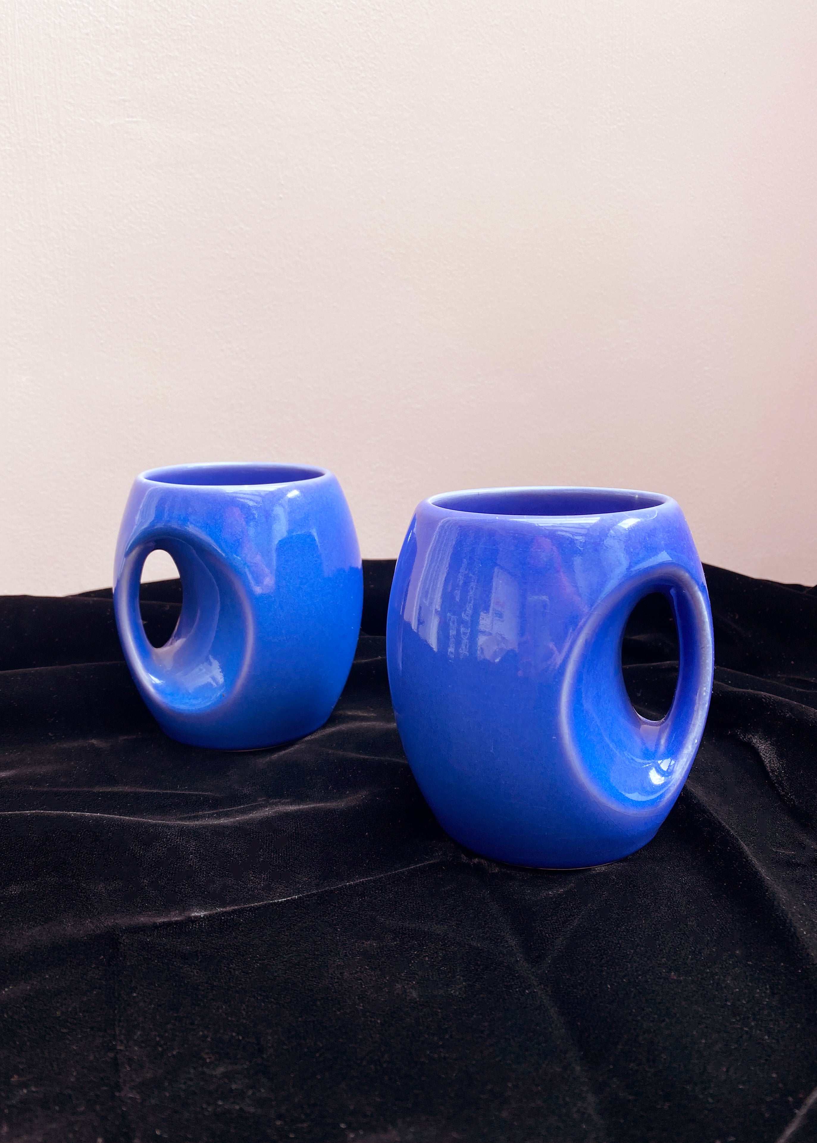 Pair of Holkham 'Owl Eye' Blue Mugs